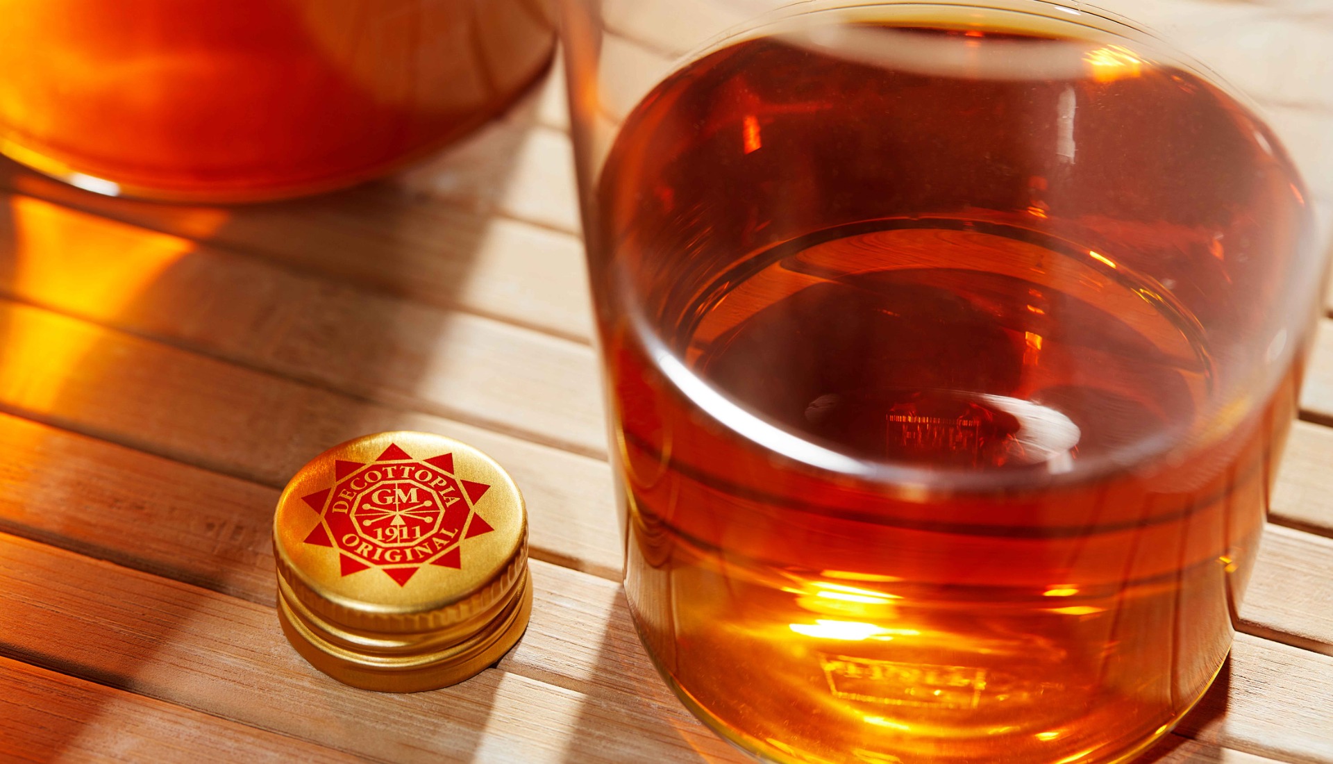 Man holding bike while standing on gray mountain